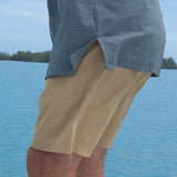 Man wearing Khaki Travel Shorts on the water